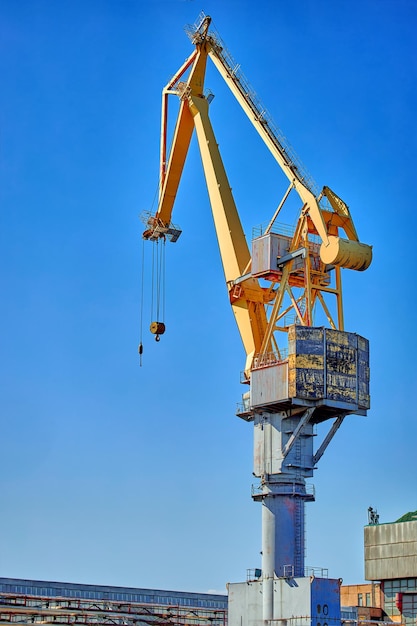 Port tower crane against a blue sky