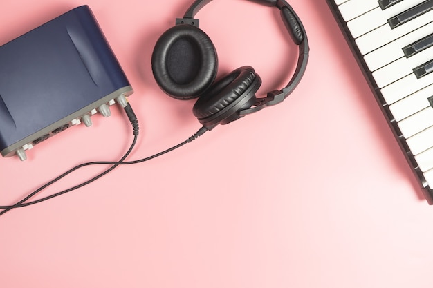 Portable Music Studio equipment on pink background