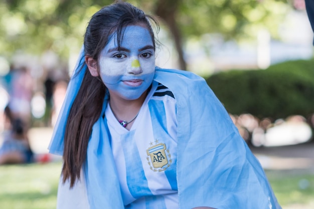 Portait of argentinian girl celebrating worldcup qatar victory