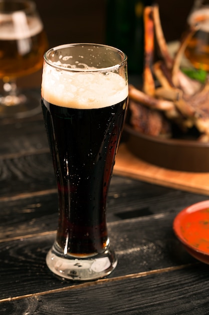 Porter beer on rustic table