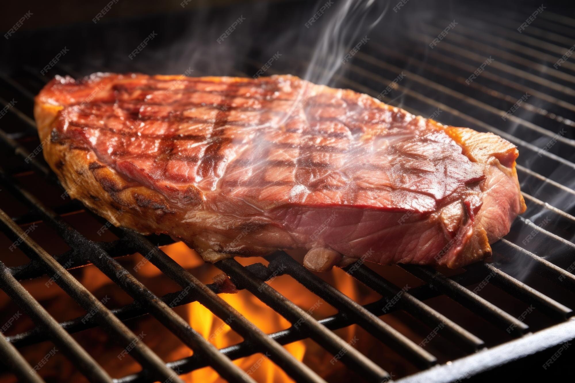 Premium AI Image Porterhouse steak on an electric grill with smoke