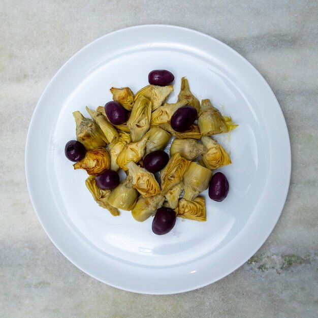 Portion of artichoke hearts and olives