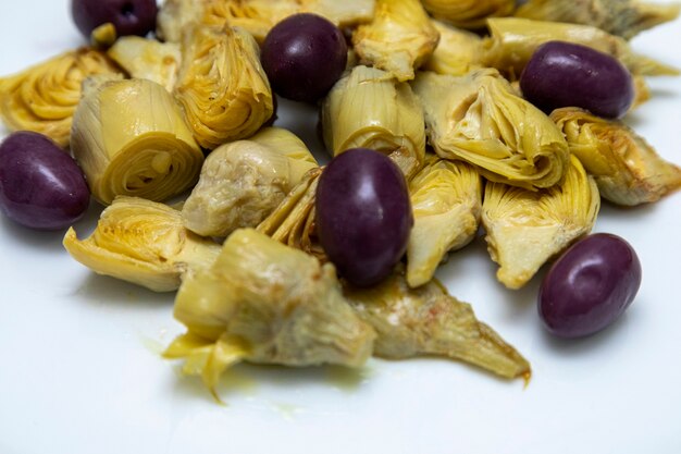 Portion of artichoke hearts and olives