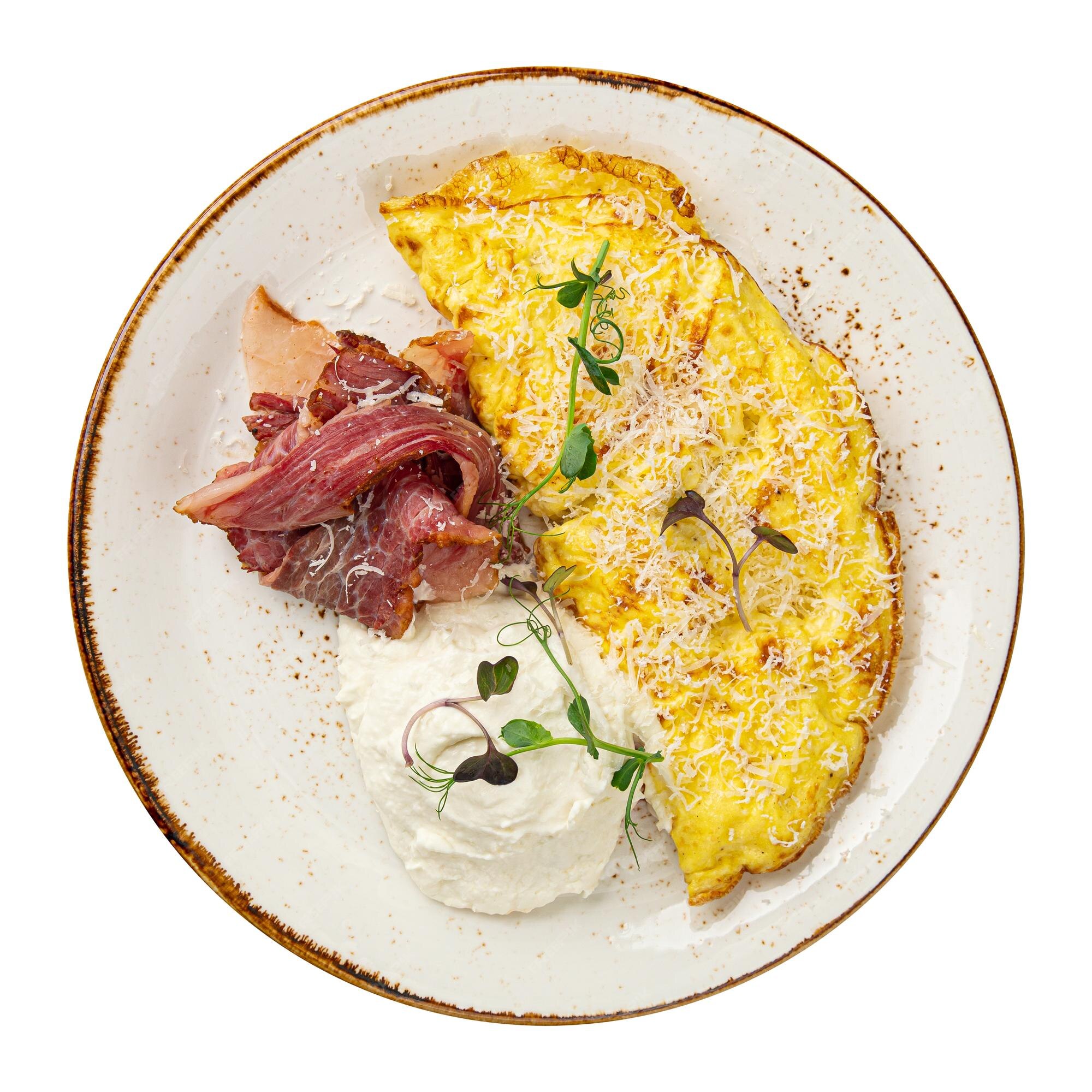 Premium Photo | Portion of breakfast with omelette and mild cheese