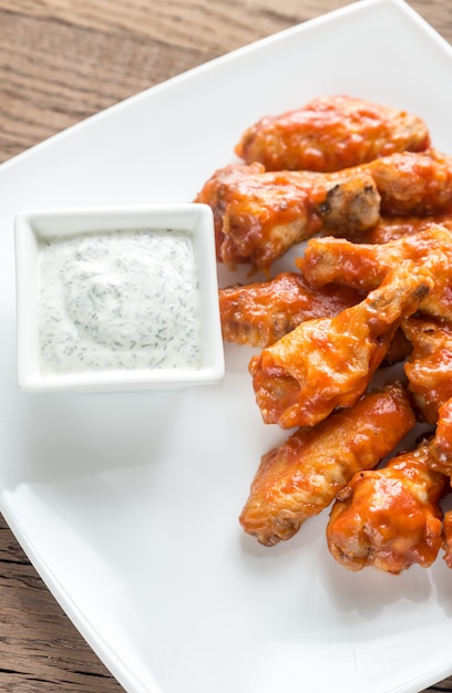 Photo portion of buffalo chicken wings