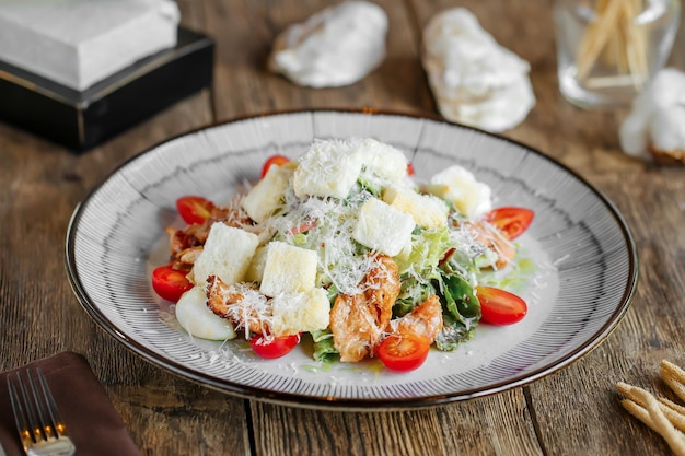 Portion of caesar salad with chicken