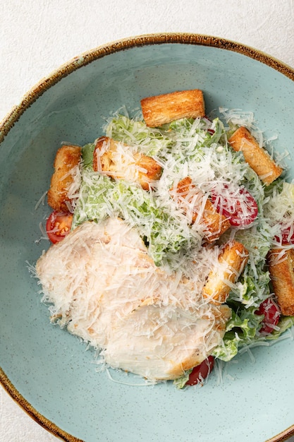 Portion of caesar salad with chicken