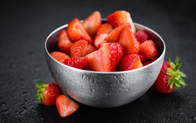 Portion of Chopped Strawberries on a slate slab