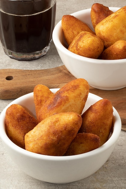 Portion of coxinha in a white bowl