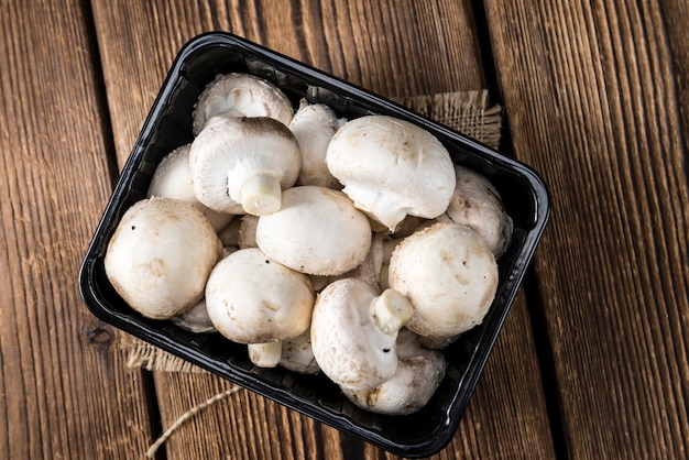 Portion of fresh white Mushrooms