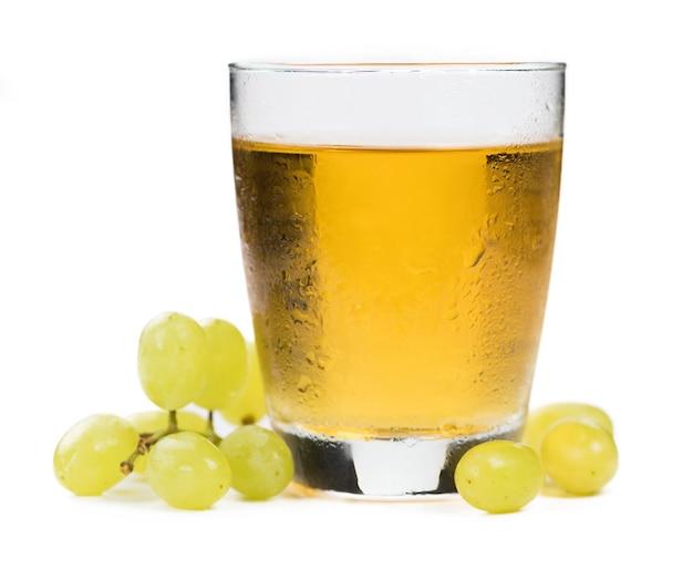 Portion of Grape Juice isolated on white background selective focus