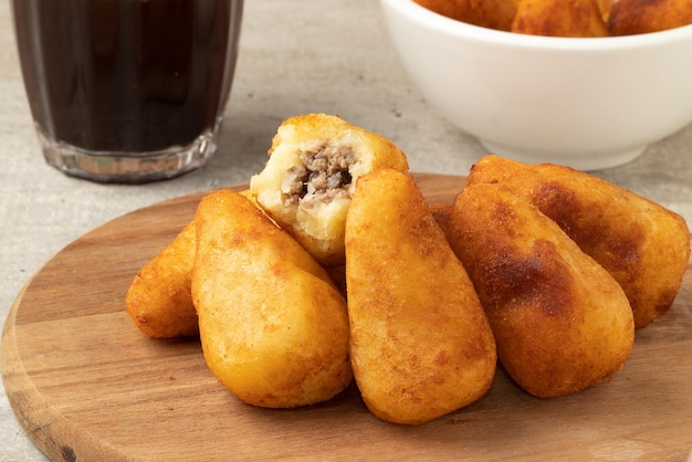 Portion of Meat coxinha on cutting board