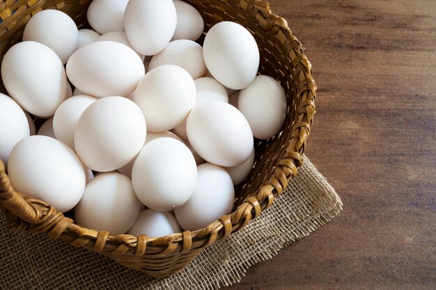 Portion of raw eggs inside the basket