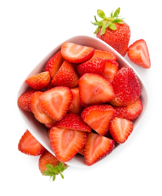 Portion of Strawberries Chopped isolated on white