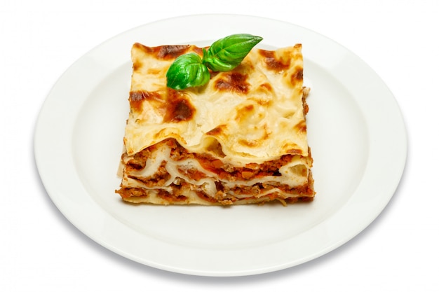 Portion of tasty lasagna isolated on white