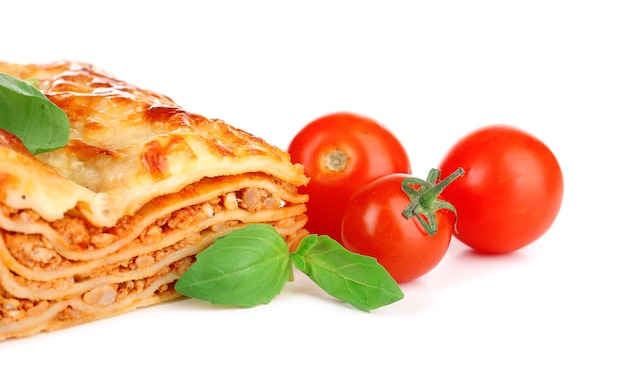 Portion of tasty lasagna isolated on white