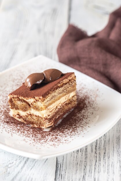 Portion of tiramisu decorated with chocolate truffle dessert