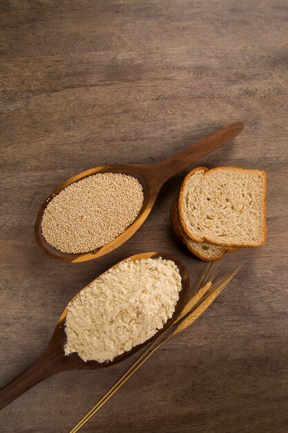 Portion of uncooked Quinoa and wey protein (detailed close-up shot)