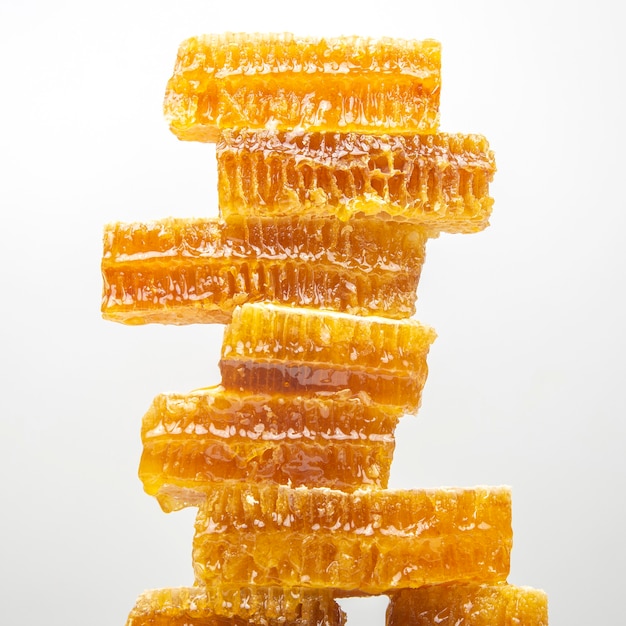 Portions of fresh honeycomb on a white background. vitamin natural food. bee work product