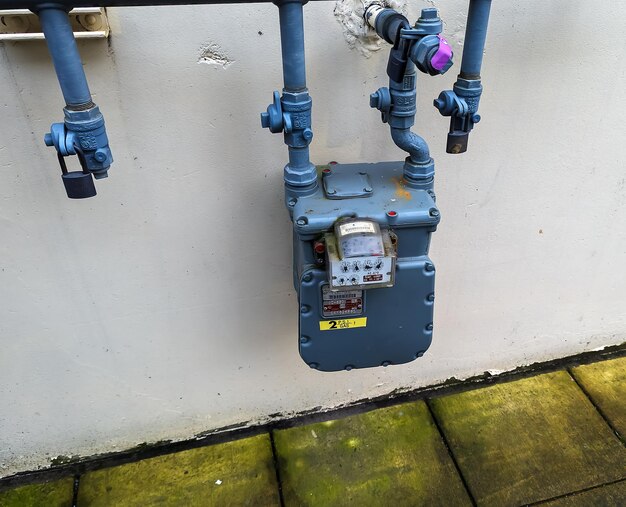 Portland Oregon USA 12282023 An outdoor gas meter is attached to the wall of a house