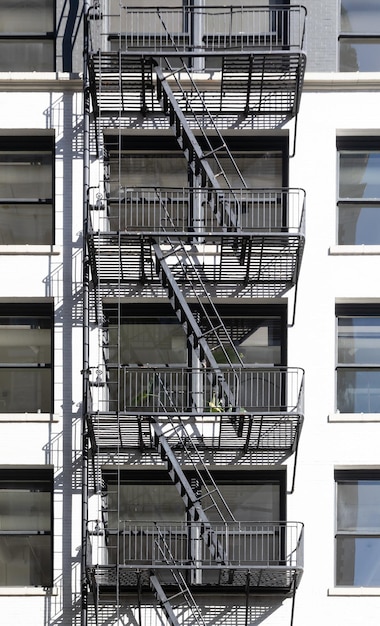 Portland or usa oct 16 2022 view of the apartment building with
a fire escape staircase fire escapes on the facades of houses in
portland streets and architecture of portland