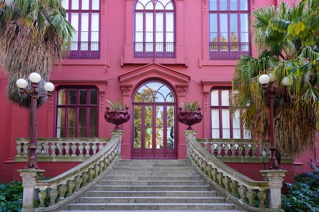 Porto Botanical Garden. Main entrance, pink facade of Casa Andresen, Porto, Portugal.