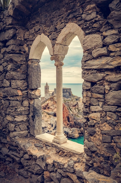 Porto Venere Italy with church of St Peter seen from ancient window Liguria coast