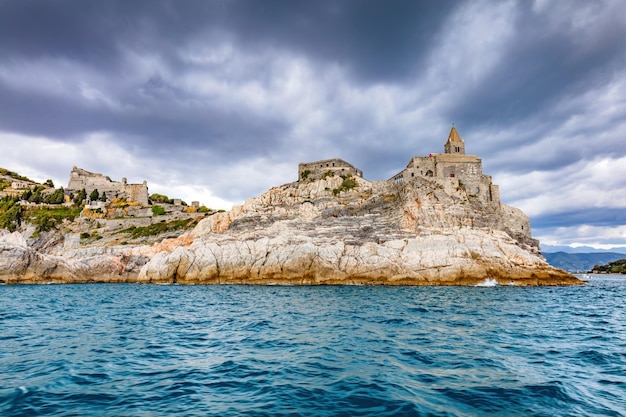 Porto Venere with Doria castle and St Peter church in Italy View from the sea
