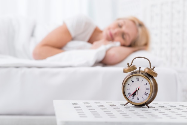 Portrait of adult woman taking a nap