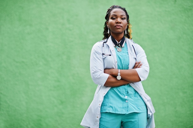 Portrait of African American female doctor with stethoscope wearing lab coat.