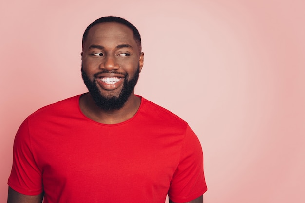 Portrait of african american male isolated over pink background