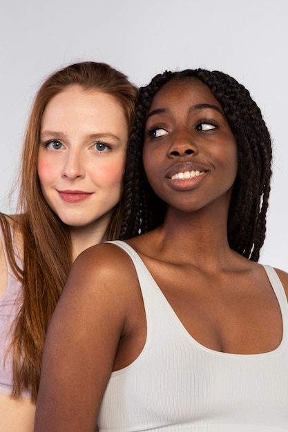 Photo portrait of african american and redhead woman