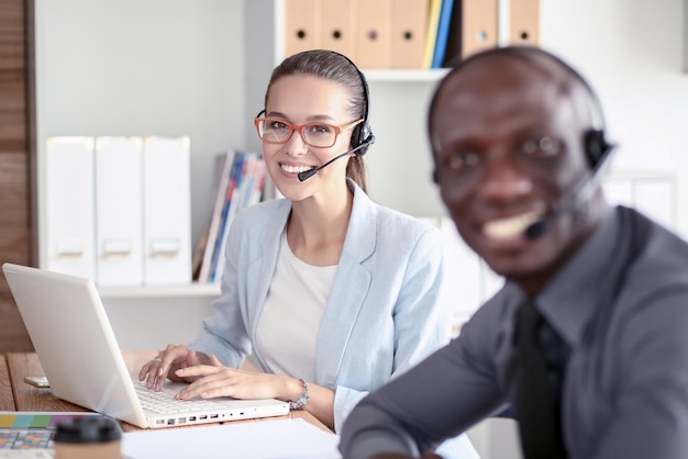 Photo portrait of an african american young business man with headset