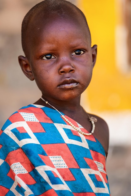 Portrait of an African child in traditional dress Masai Kenya