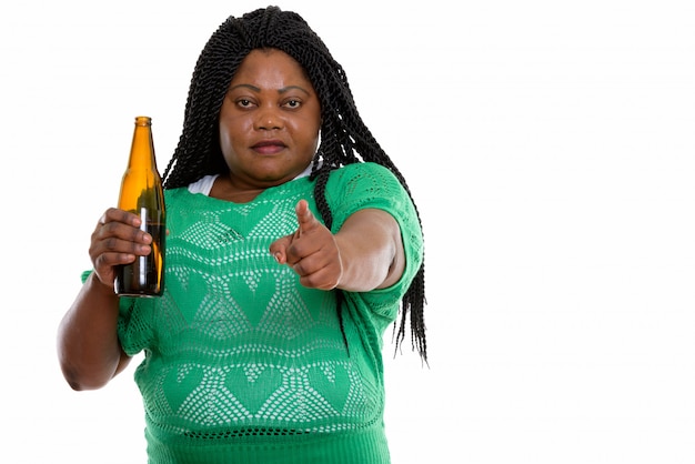 portrait of African woman holding drink