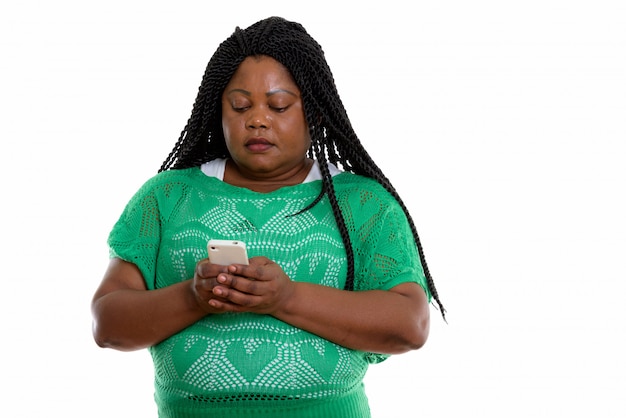 portrait of African woman holding smartphone