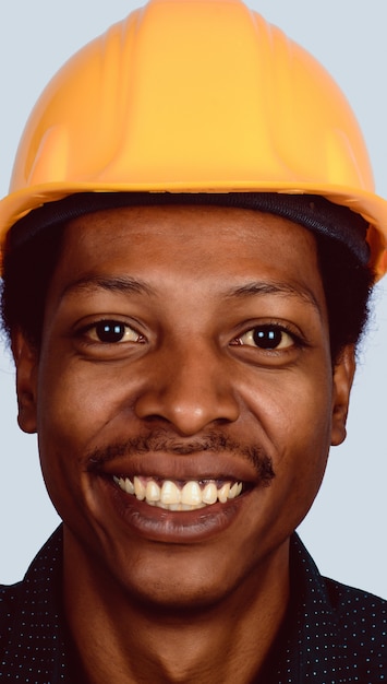 Portrait of Afro american architect in hard hat