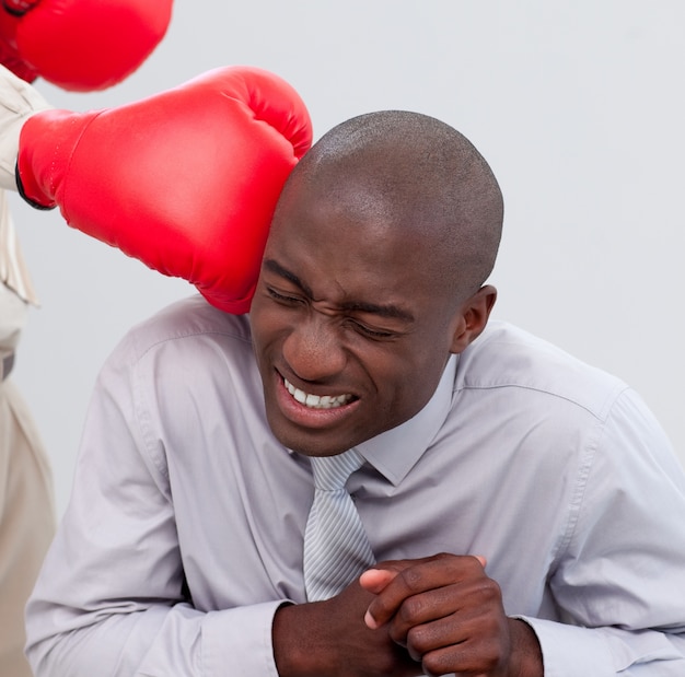 Portrait of an Afro-American businessman being boxed