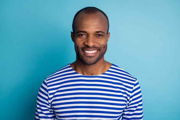 Portrait of afro american guy look copyspace wear striped sailor vest