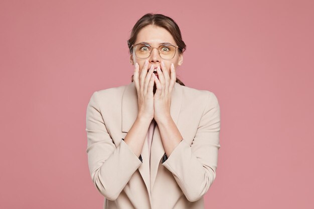 Portrait of amazed woman in jacket