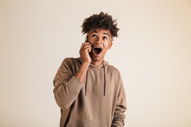 Portrait of an amazed young afro american man