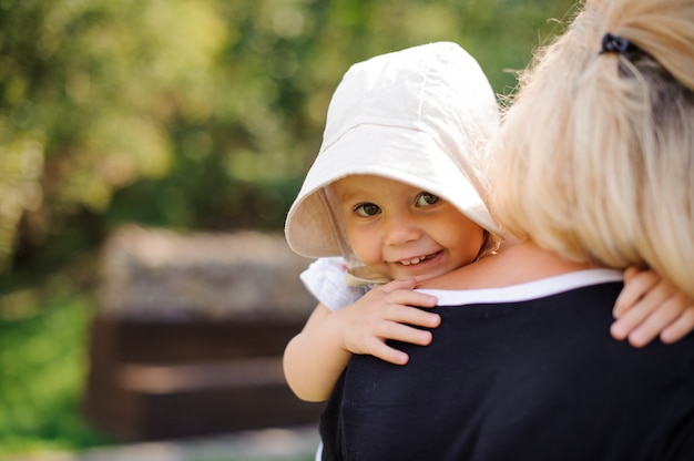 Portrait of angelic baby and her mother