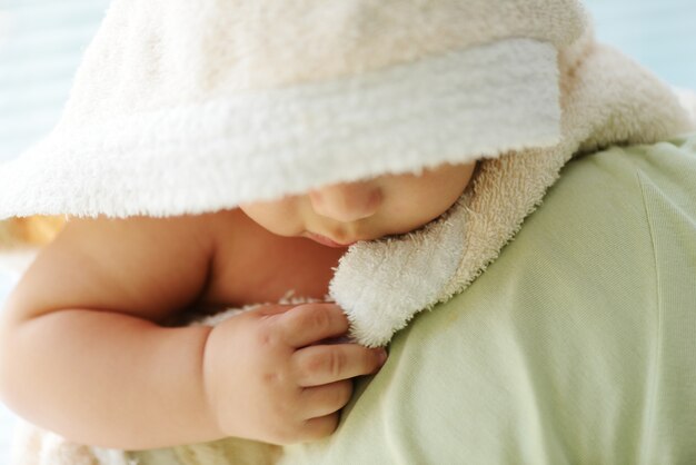 Portrait of angelic baby and his mother