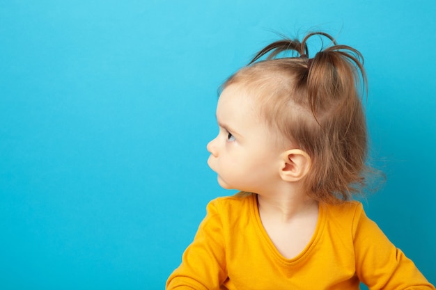 Portrait of angry little girl with copy space. Top view