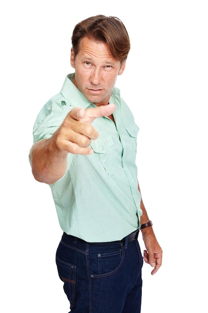 Portrait angry and man pointing upset and mature guy isolated on white studio background Male gentleman and gesture for argument anger and screaming for fight issues and problems on backdrop