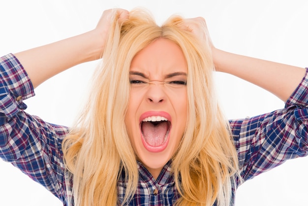 Portrait of angry woman screaming