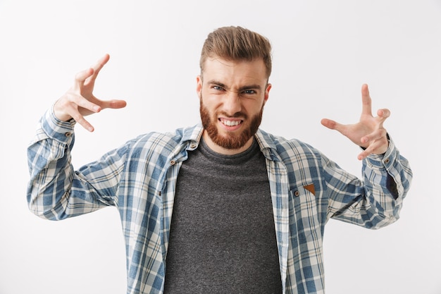 Portrait of an angry young bearded man