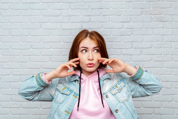 Portrait angry young woman screaming