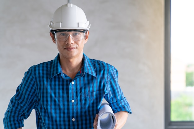 Portrait of asian architect man in construction renovation site