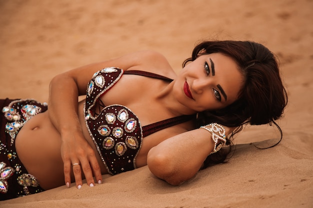 Portrait of asian beautiful sexy woman wear in arab costume,Princess of desert concept.